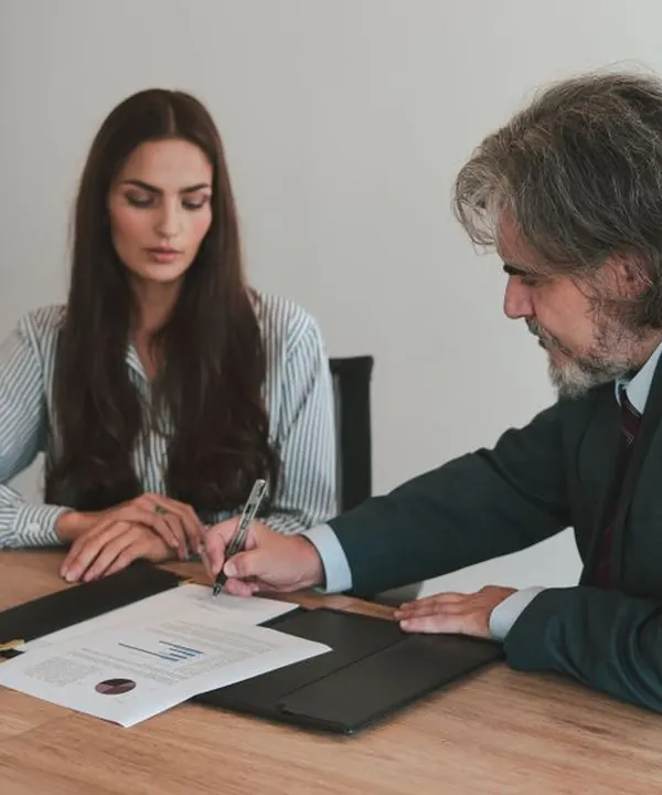 CPA and client reviewing paperwork together
